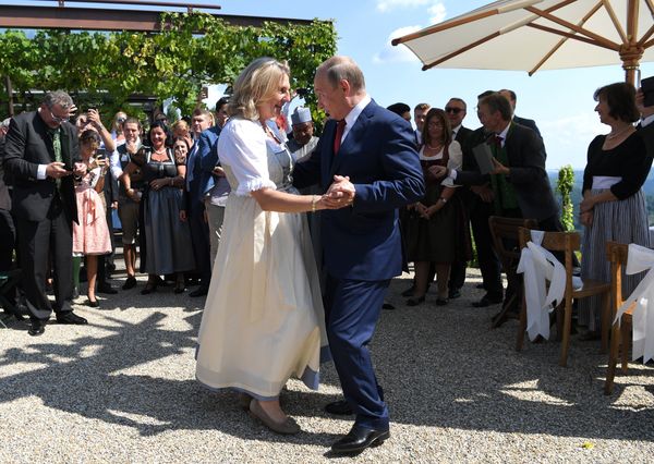 Russian President Vladimir Putin, right, congratulates Austrian Foreign Minister Karin Kneissl as he attends the wedding of Kneissl with with Austrian businessman Wolfgang Meilinger in Gamlitz, southern Austria, Saturday, Aug. 18, 2018. Russian President Vladimir Putin, right, congratulates Austrian Foreign Minister Karin Kneissl as he attends the wedding of Kneissl with with Austrian businessman Wolfgang Meilinger in Gamlitz, southern Austria, Saturday, Aug. 18, 2018. - Sputnik International