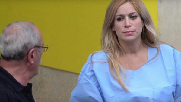 Aurea Vasquez Rijos' trial for her alleged involvement in her husband's 2005 murder is expected to begin on Tuesday. She is pictured above after she was extradited to Puerto Rico in 2015 Aurea Vasquez Rijos' trial for her alleged involvement in her husband's 2005 murder is expected to begin on Tuesday. She is pictured above after she was extradited to Puerto Rico in 2015 - Sputnik International