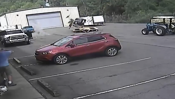 Arkansas' Little Rock Police Department release surveillance footage showing moment that chopper violently crashed while undergoing equipment testing Arkansas' Little Rock Police Department release surveillance footage showing moment that chopper violently crashed while undergoing equipment testing - Sputnik International