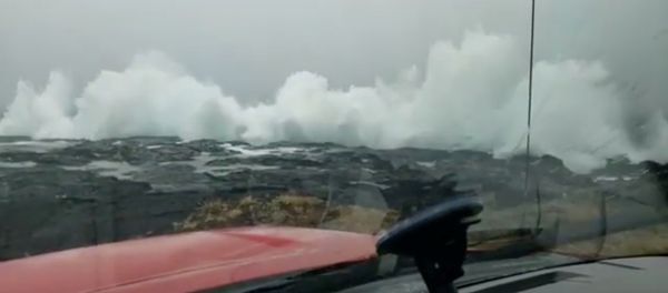 Waves crash on the coast as Hurricane Lane approaches Ka'u, Hawaii, U.S. August 22 2018, in this still image obtained from a social media video. Video taken from inside a vehicle. Courtesy of Ken Boyer - Sputnik International