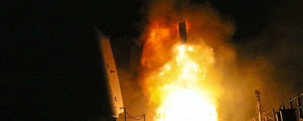 In this image provided by the U.S. Navy, the guided-missile cruiser USS Monterey (CG 61) fires a Tomahawk land attack missile Saturday, April 14, 2018, as part of the military response to Syria's alleged use of chemical weapons on April 7. - Sputnik International