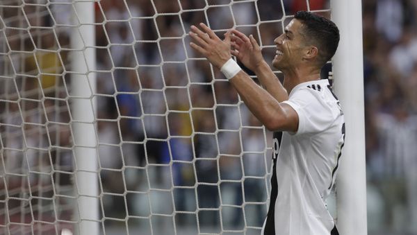 Juventus' Cristiano Ronaldo gestures towards the crowd after teammate Juventus' Mario Mandzukic scored his sides 2nd goal of the game during the Serie A soccer match between Juventus and Lazio at the Allianz Stadium in Turin, Italy, Saturday, Aug. 25, 2018 - Sputnik International