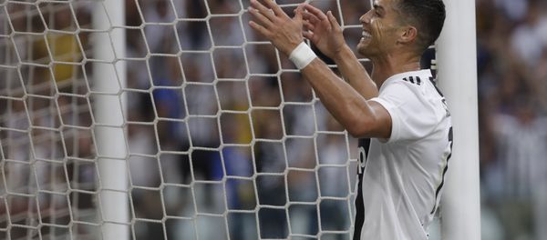 Juventus' Cristiano Ronaldo gestures towards the crowd after teammate Juventus' Mario Mandzukic scored his sides 2nd goal of the game during the Serie A soccer match between Juventus and Lazio at the Allianz Stadium in Turin, Italy, Saturday, Aug. 25, 2018 Juventus' Cristiano Ronaldo gestures towards the crowd after teammate Juventus' Mario Mandzukic scored his sides 2nd goal of the game during the Serie A soccer match between Juventus and Lazio at the Allianz Stadium in Turin, Italy, Saturday, Aug. 25, 2018 - Sputnik International