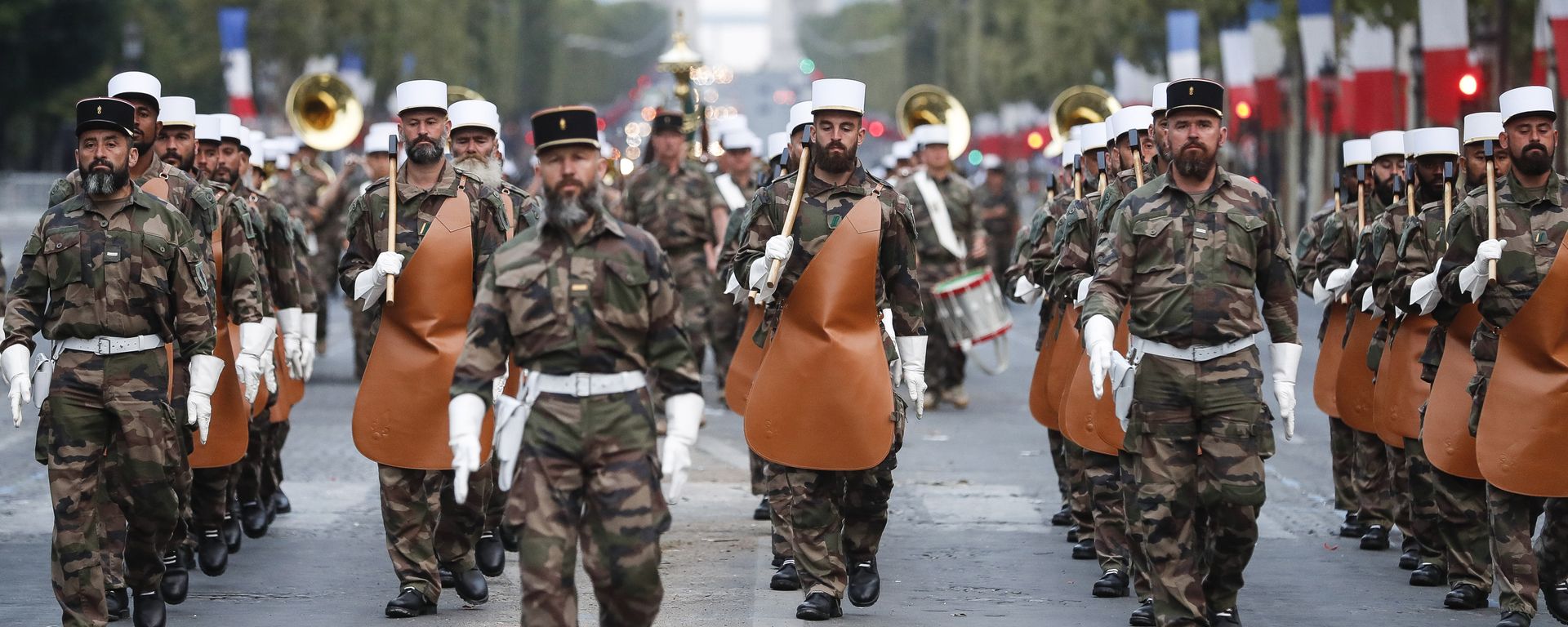 Soldiers of the French Foreign Legion parade on the Champs Elysees avenue during a rehearsal for Bastille Day, early Wednesday, July 11, 2018 in Paris Soldiers of the French Foreign Legion parade on the Champs Elysees avenue during a rehearsal for Bastille Day, early Wednesday, July 11, 2018 in Paris - Sputnik International, 1920, 23.08.2022