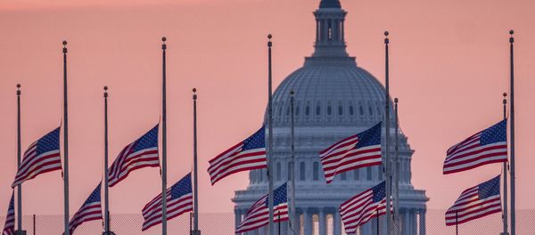 Flags flying a half-staff in honor of Sen. John McCain, R-Ariz., frame the U.S. Capital at daybreak in Washington, Sunday, Aug. 26, 2018. Flags flying a half-staff in honor of Sen. John McCain, R-Ariz., frame the U.S. Capital at daybreak in Washington, Sunday, Aug. 26, 2018. - Sputnik International