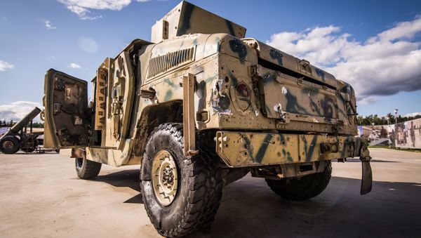A trophu Hummer shown at the exhibition of weapons taken from Syrian militants as part of the 4th International Military Technical Forum, Army 2018, in Kubinka A trophu Hummer shown at the exhibition of weapons taken from Syrian militants as part of the 4th International Military Technical Forum, Army 2018, in Kubinka - Sputnik International