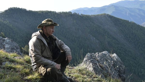 26 August, 2018. Russian President Vladimir Putin on a vacation in the Republic of Tuva - Sputnik International