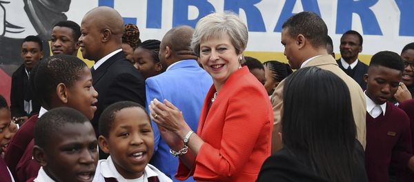British Prime Minister Theresa May meets pupils during a visit at the the ID Mkhize High School in Gugulethu, Cape Town, South Africa, Tuesday, Aug. 28, 2018. Theresa May has started a three-nation visit to Africa where she is to meet South African President Cyril Ramaphosa British Prime Minister Theresa May meets pupils during a visit at the the ID Mkhize High School in Gugulethu, Cape Town, South Africa, Tuesday, Aug. 28, 2018. Theresa May has started a three-nation visit to Africa where she is to meet South African President Cyril Ramaphosa - Sputnik International