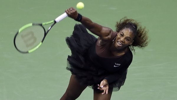 Serena Williams, of the United States, serves to Magda Linette, of Poland, during the first round of the U.S. Open tennis tournament, Monday, Aug. 27, 2018, in New York Serena Williams, of the United States, serves to Magda Linette, of Poland, during the first round of the U.S. Open tennis tournament, Monday, Aug. 27, 2018, in New York - Sputnik International