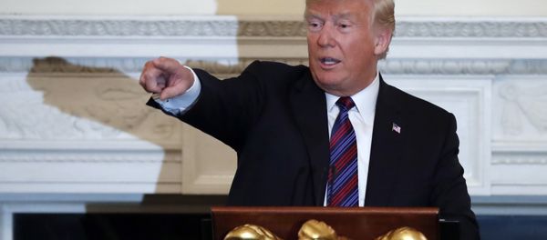President Donald Trump speaks during a dinner for evangelical leaders in the State Dining Room of the White House, Monday, Aug. 27, 2018, in Washington President Donald Trump speaks during a dinner for evangelical leaders in the State Dining Room of the White House, Monday, Aug. 27, 2018, in Washington - Sputnik International