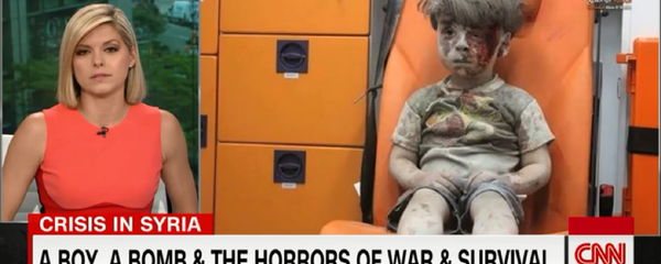 CNN anchor Kate Bolduan chokes up after Omran Daqneesh, 5, was injured in an alleged airstrike. The boy's father came out in support of Assad and criticized rebel groups for using his son's image as propaganda in June 2017. CNN anchor Kate Bolduan chokes up after Omran Daqneesh, 5, was injured in an alleged airstrike. The boy's father came out in support of Assad and criticized rebel groups for using his son's image as propaganda in June 2017. - Sputnik International