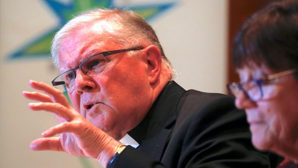 Archbishop Mark Coleridge, President of the Australian Catholic Bishops Conference in Australia, speaks as Sister Monica Cavanagh, President of Catholic Religious Australia, listens during a media conference in Sydney, Australia, August 31, 2018 - Sputnik International