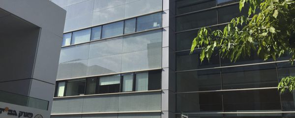 The logo of the Israeli NSO Group company is displayed on a building where they had offices until few months ago in Herzliya, Israel, Thursday, Aug. 25, 2016. - Sputnik International