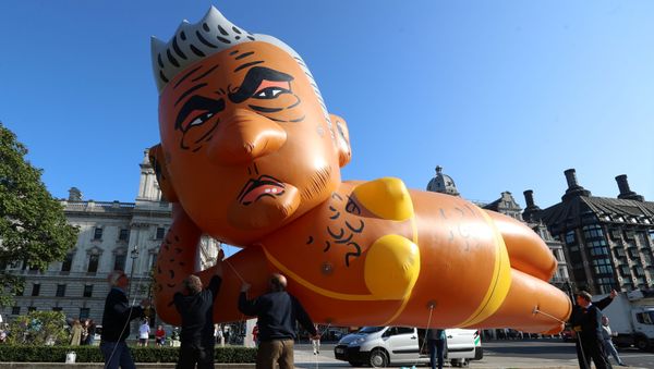 Demonstrators launch a giant bikini-clad blimp of London Mayor Sadiq Khan over Parliament Square in Westminster London, Britain, September 1, 2018. - Sputnik International