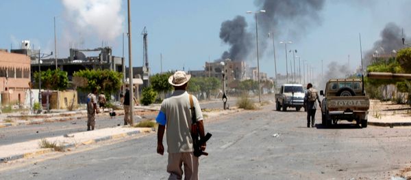 Smoke rises during a battle between Libyan forces allied with the U.N.-backed government and Islamic State fighters in neighborhood Number Two in Sirte, Libya August 16, 2016 Smoke rises during a battle between Libyan forces allied with the U.N.-backed government and Islamic State fighters in neighborhood Number Two in Sirte, Libya August 16, 2016 - Sputnik International