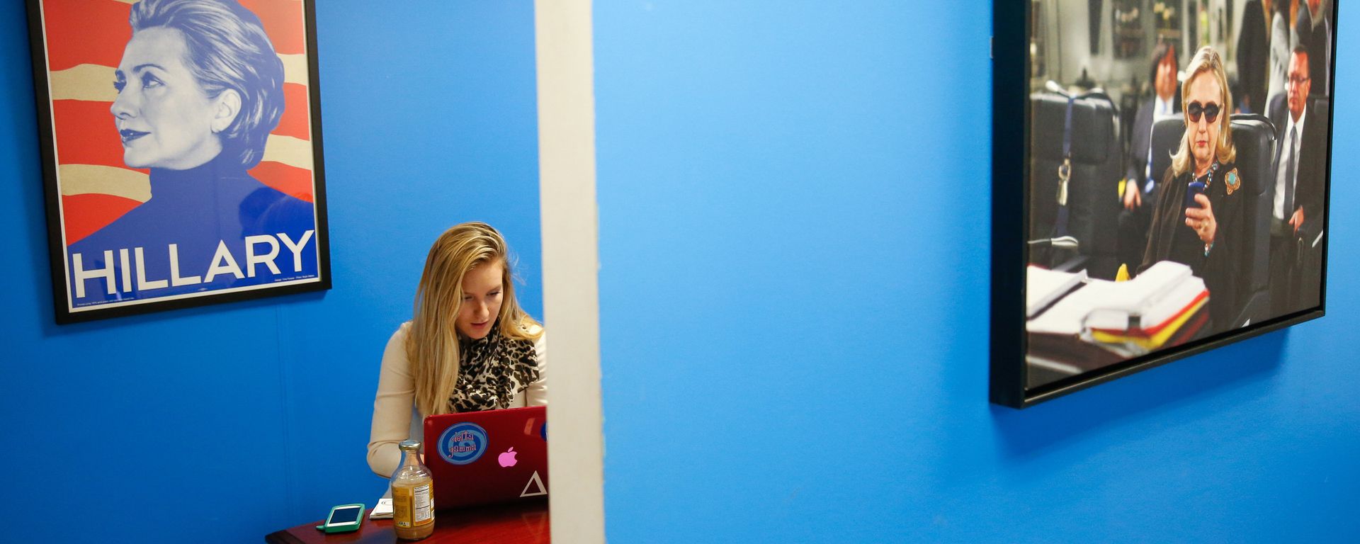 In this April 3, 2015, photo, intern Jessica Lis works at the Ready for Hillary super PAC offices in Arlington, Va. When Hillary Rodham Clinton announces her presidential campaign, as expected, more than a dozen people in a nondescript office building overlooking the Potomac River will blast out the news by email and social media to millions of her supporters, urging them to sign onto her campaign In this April 3, 2015, photo, intern Jessica Lis works at the Ready for Hillary super PAC offices in Arlington, Va. When Hillary Rodham Clinton announces her presidential campaign, as expected, more than a dozen people in a nondescript office building overlooking the Potomac River will blast out the news by email and social media to millions of her supporters, urging them to sign onto her campaign - Sputnik International, 1920, 27.01.2022