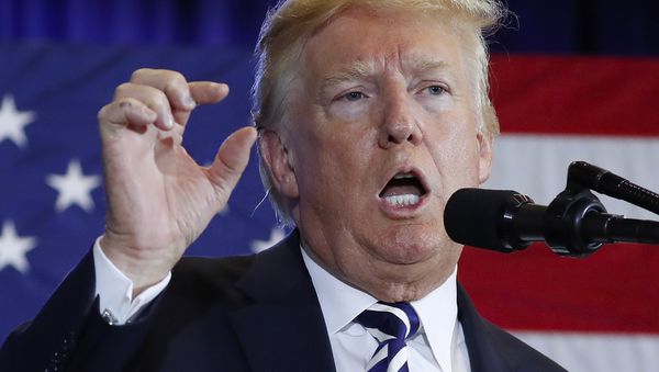 In this Aug. 31, 2018 photo, President Donald Trump gestures while speaking at the Harris Conference Center in Charlotte, N.C. President Donald Trump is escalating his attacks on Attorney General Jeff Sessions, suggesting the embattled official should have intervened in investigations of two GOP congressmen to help Republicans in the midterms. Trump tweeted Monday that “investigations of two very popular Republican Congressmen were brought to a well publicized charge, just ahead of the Mid-Terms, by the Jeff Sessions Justice Department.” - Sputnik International