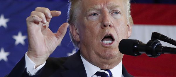 In this Aug. 31, 2018 photo, President Donald Trump gestures while speaking at the Harris Conference Center in Charlotte, N.C. President Donald Trump is escalating his attacks on Attorney General Jeff Sessions, suggesting the embattled official should have intervened in investigations of two GOP congressmen to help Republicans in the midterms. Trump tweeted Monday that “investigations of two very popular Republican Congressmen were brought to a well publicized charge, just ahead of the Mid-Terms, by the Jeff Sessions Justice Department.” - Sputnik International