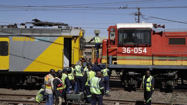 The scene of an early morning train collision in a suburb of Johannesburg Tuesday, Sept. 4, 2018 The scene of an early morning train collision in a suburb of Johannesburg Tuesday, Sept. 4, 2018 - Sputnik International