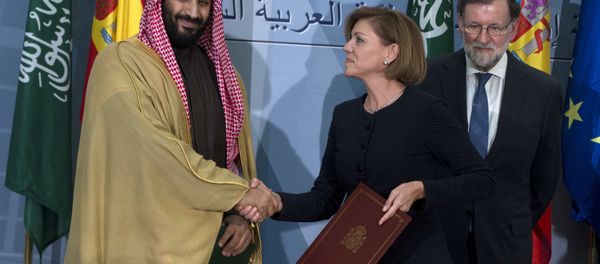 FILE - In this April 12, 2018 file photo, Saudi Arabia Crown Prince Mohammed bin Salman, left and Spain's then Defense Minister Maria Dolores Cospedal shake hands after signing bi-lateral agreements in the presence of the then Prime Minister of Spain Mariano Rajoy, right, at the Moncloa Palace in Madrid, Spain. Spain has cancelled the sale of 400 laser-guided bombs to Saudi Arabia it was reported Tuesday Sept. 4, 2018, amid fears that the weapons could be used in the Riyadh-led coalition fighting the Iran-aligned Houthi rebels in Yemen FILE - In this April 12, 2018 file photo, Saudi Arabia Crown Prince Mohammed bin Salman, left and Spain's then Defense Minister Maria Dolores Cospedal shake hands after signing bi-lateral agreements in the presence of the then Prime Minister of Spain Mariano Rajoy, right, at the Moncloa Palace in Madrid, Spain. Spain has cancelled the sale of 400 laser-guided bombs to Saudi Arabia it was reported Tuesday Sept. 4, 2018, amid fears that the weapons could be used in the Riyadh-led coalition fighting the Iran-aligned Houthi rebels in Yemen - Sputnik International
