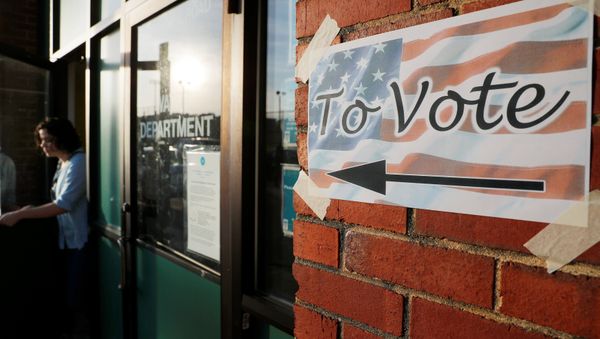 A voter leaves a polling site after casting a ballot in the Massachusetts Primary Election in Somerville, Massachusetts, U.S., September 4, 2018 A voter leaves a polling site after casting a ballot in the Massachusetts Primary Election in Somerville, Massachusetts, U.S., September 4, 2018 - Sputnik International