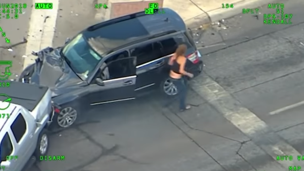 Texas authorities release footage of woman leading officers on a wild high-speed chase with baby in the back seat - Sputnik International