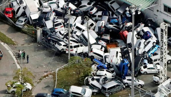 Vehicles damaged by Typhoon Jebi are seen in Kobe, western Japan, in this photo taken by Kyodo September 5, 2018 Vehicles damaged by Typhoon Jebi are seen in Kobe, western Japan, in this photo taken by Kyodo September 5, 2018 - Sputnik International