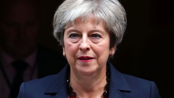 Britain's Prime Minister Theresa May leaves 10 Downing Street in London, September 5, 2018. Britain's Prime Minister Theresa May leaves 10 Downing Street in London, September 5, 2018. - Sputnik International