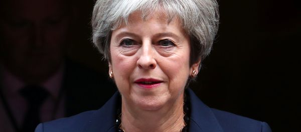 Britain's Prime Minister Theresa May leaves 10 Downing Street in London, September 5, 2018. Britain's Prime Minister Theresa May leaves 10 Downing Street in London, September 5, 2018. - Sputnik International