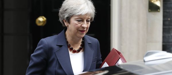 Britain's Prime Minister Theresa May leaves 10 Downing street to take part in Prime Ministers questions at the House of Commons in London on September 5, 2018. Britain's Prime Minister Theresa May leaves 10 Downing street to take part in Prime Ministers questions at the House of Commons in London on September 5, 2018. - Sputnik International