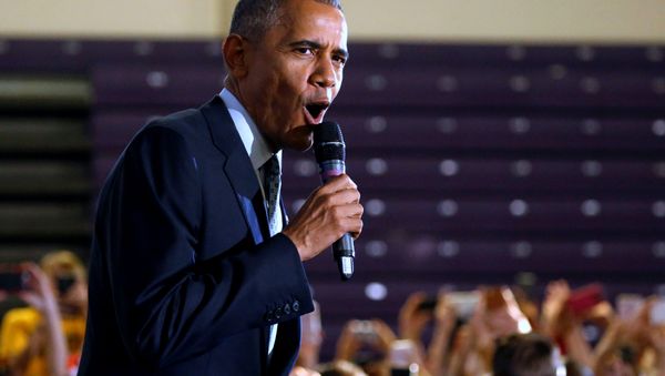 U.S. President Barack Obama greets supporters in an overflow room before he participates in a Get Out the Early Vote campaign event for Hillary Clinton in Columbus, Ohio, U.S., November 1, 2016 - Sputnik International
