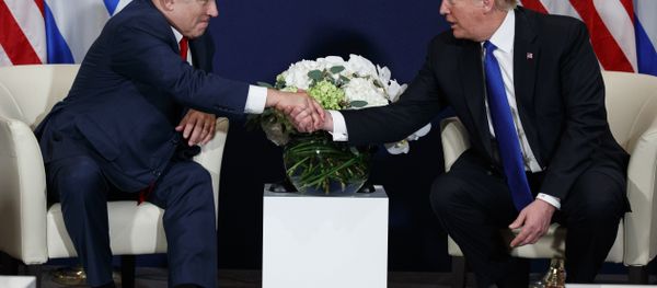 This Jan. 25, 2018 file photo shows President Donald Trump meeting with Israeli Prime Minister Benjamin Netanyahu at the World Economic Forum in Davos. There’s much to celebrate but plenty of cause for trepidation, too, as Trump and Netanyahu meet Monday, March 5, 2018 at the White House. For all his talk about brokering the “ultimate deal” between Israelis and Palestinians, Trump’s long-awaited peace plan has yet to arrive, even as Palestinians and other critics insist it will be dead on arrival This Jan. 25, 2018 file photo shows President Donald Trump meeting with Israeli Prime Minister Benjamin Netanyahu at the World Economic Forum in Davos. There’s much to celebrate but plenty of cause for trepidation, too, as Trump and Netanyahu meet Monday, March 5, 2018 at the White House. For all his talk about brokering the “ultimate deal” between Israelis and Palestinians, Trump’s long-awaited peace plan has yet to arrive, even as Palestinians and other critics insist it will be dead on arrival - Sputnik International
