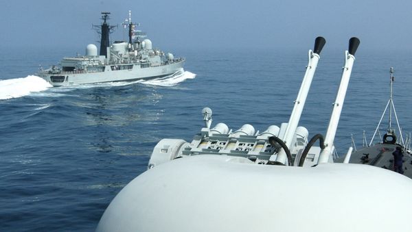 British Royal Navy Guided missile Destroyer HMS Exeter (L) passes a Chinese naval vessel, off the eastern port city of Qingdao. File photo British Royal Navy Guided missile Destroyer HMS Exeter (L) passes a Chinese naval vessel, off the eastern port city of Qingdao. File photo - Sputnik International