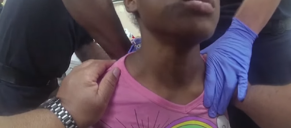 Cincinnati Police Department releases body-worn camera footage obtained by officer who deployed his taser stun gun on an 11-year-old - Sputnik International