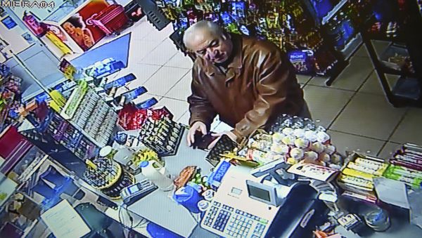 A still image from CCTV footage recorded on February 27, 2018 shows former Russian spy Sergei Skripal buying groceries at the Bargain Stop convenience store in Salisbury on February 27, 2018. - Sputnik International
