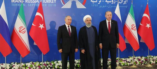 Russian President Vladimir Putin, Turkish President Recep Erdogan and Iran's President Hassan Rouhani are expected to discuss trilateral ties as well as the recent development of the situation in Syria. - Sputnik International