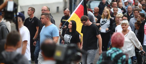 People attend a right wing protest in Koethen, Germany, September 9, 2018, after a 22-year-old German man died overnight in the eastern town of Koethen and two Afghans have been detained on suspicion of killing him. People attend a right wing protest in Koethen, Germany, September 9, 2018, after a 22-year-old German man died overnight in the eastern town of Koethen and two Afghans have been detained on suspicion of killing him. - Sputnik International