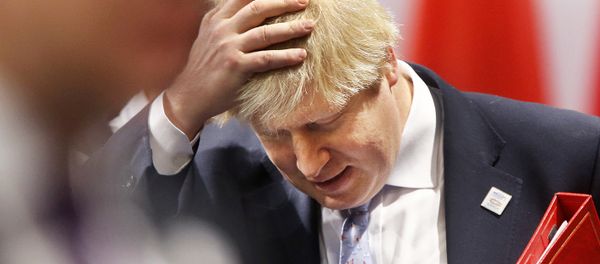 Britain's Foreign Minister Boris Johnson adjusts his hair at the beginning of a working session during the G-20 Foreign Ministers meeting in Bonn, Germany, Thursday, Feb. 16, 2017. Britain's Foreign Minister Boris Johnson adjusts his hair at the beginning of a working session during the G-20 Foreign Ministers meeting in Bonn, Germany, Thursday, Feb. 16, 2017. - Sputnik International