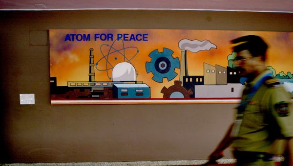 A policeman walks past a mural at the Bhabha Atomic Research Centre (BARC) Training School where Prime Minister Manmohan Singh is visiting, in Mumbai, India, Friday, Aug. 31, 2007. A policeman walks past a mural at the Bhabha Atomic Research Centre (BARC) Training School where Prime Minister Manmohan Singh is visiting, in Mumbai, India, Friday, Aug. 31, 2007. - Sputnik International
