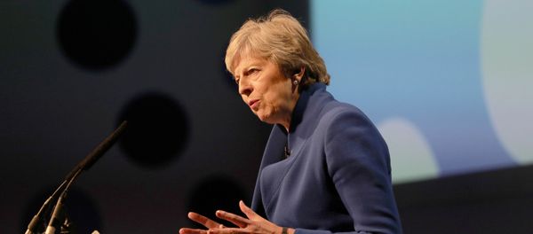 Britain's Prime Minister Theresa May makes a speech at the Zero Emission Vehicle Summit at the ICC in Birmingham September 11, 2018 - Sputnik International