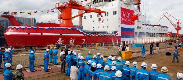 People attend the launch ceremony of China's first domestically built polar icebreaker Xuelong 2, or Snow Dragon 2, at a shipyard in Shanghai, China September 10, 2018. People attend the launch ceremony of China's first domestically built polar icebreaker Xuelong 2, or Snow Dragon 2, at a shipyard in Shanghai, China September 10, 2018. - Sputnik International