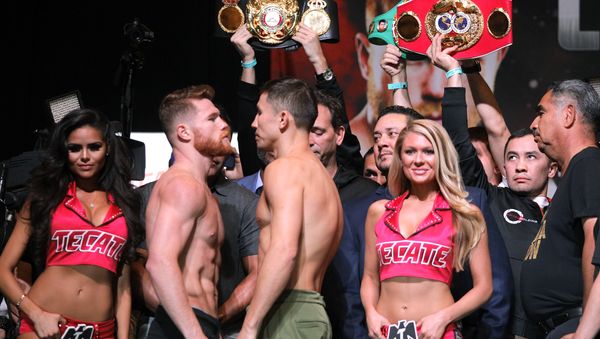 Boxers Canelo Alvarez (L) and Gennady Golovkin face-off during their weigh-in at the MGM Grand Hotel & Casino on September 15, 2017 in Las Vegas, Nevada Boxers Canelo Alvarez (L) and Gennady Golovkin face-off during their weigh-in at the MGM Grand Hotel & Casino on September 15, 2017 in Las Vegas, Nevada - Sputnik International