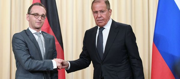 Russian Acting Foreign Minister Sergei Lavrov and German Foreign Minister Heiko Maas, left, at a joint news conference following a meeting at the Russian Foreign Ministry Reception House Russian Acting Foreign Minister Sergei Lavrov and German Foreign Minister Heiko Maas, left, at a joint news conference following a meeting at the Russian Foreign Ministry Reception House - Sputnik International
