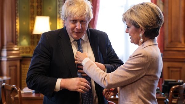 British Foreign Secretary Boris Johnson (L) has his tie straightened by Australian Foreign Minister Julie Bishop (R) at the Foreign and Commonwealth Office in central London on February 23, 2017. British Foreign Secretary Boris Johnson (L) has his tie straightened by Australian Foreign Minister Julie Bishop (R) at the Foreign and Commonwealth Office in central London on February 23, 2017. - Sputnik International