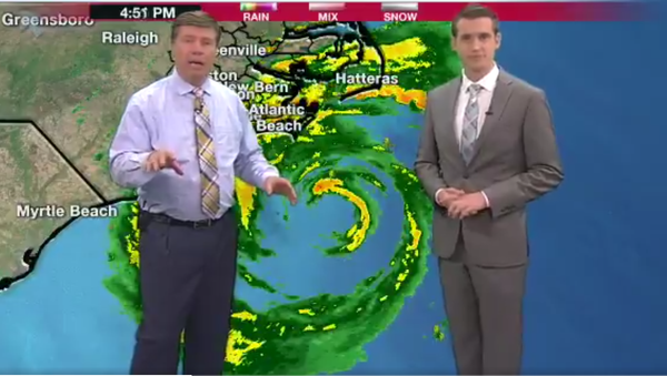 Meteorologists in North Carolina station during Florence hurricane. - Sputnik International
