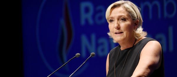 Leader of France's Rassemblement National (RN) far-right political party Marine Le Pen gestures as she delivers a speech at a meeting in Fréjus, southern France on September 16, 2018. Leader of France's Rassemblement National (RN) far-right political party Marine Le Pen gestures as she delivers a speech at a meeting in Fréjus, southern France on September 16, 2018. - Sputnik International