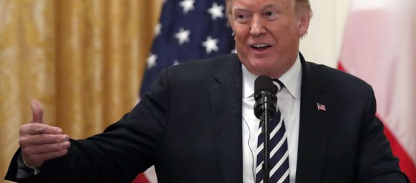 President Donald Trump speaks during a news conference with Polish President Andrzej Duda, in the East Room of the White House, Tuesday, Sept. 18, 2018, in Washington - Sputnik International