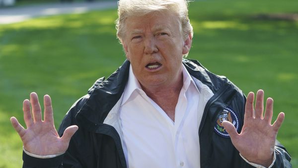 President Donald Trump talks to media before boarding Marine One on the South Lawn of the White House in Washington, Wednesday, Sept. 19, 2018, for the short trip to Andrews Air Force Base en route to Havelock, N.C. President Donald Trump talks to media before boarding Marine One on the South Lawn of the White House in Washington, Wednesday, Sept. 19, 2018, for the short trip to Andrews Air Force Base en route to Havelock, N.C. - Sputnik International