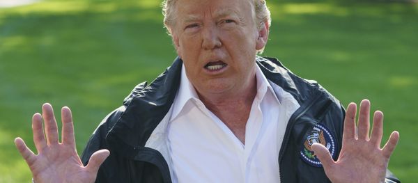 President Donald Trump talks to media before boarding Marine One on the South Lawn of the White House in Washington, Wednesday, Sept. 19, 2018, for the short trip to Andrews Air Force Base en route to Havelock, N.C. President Donald Trump talks to media before boarding Marine One on the South Lawn of the White House in Washington, Wednesday, Sept. 19, 2018, for the short trip to Andrews Air Force Base en route to Havelock, N.C. - Sputnik International