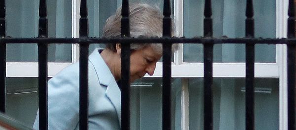 Britain's Prime Minister Theresa May arrives at the back entrance of 10 Downing Street in London, September 21, 2018 - Sputnik International